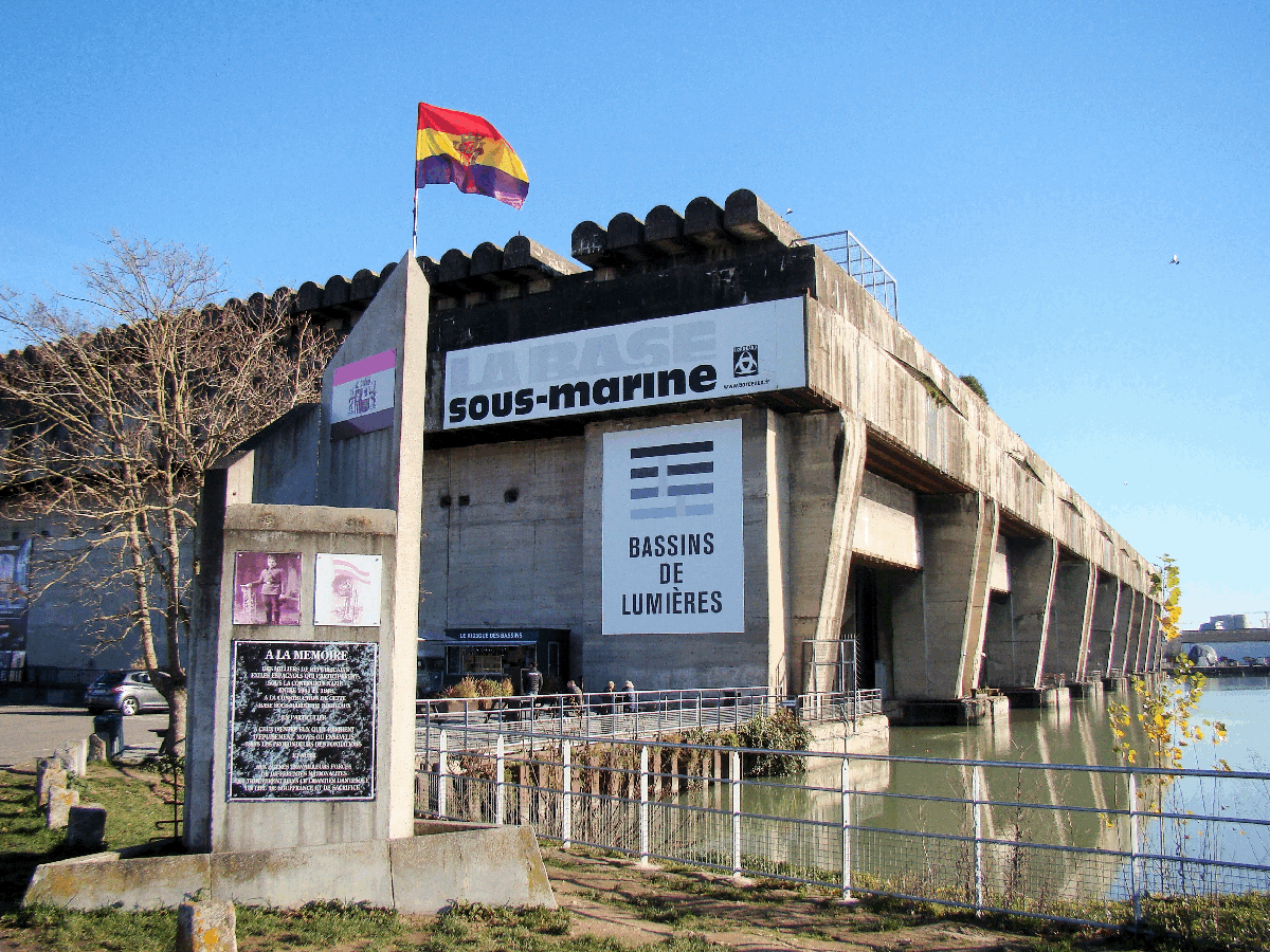 Bassins des Lumières in Bordeaux, France, with memorial in honour of the Spanish Republican prisoners who helped build the submarine base, 2021, Wikipedia Commons 