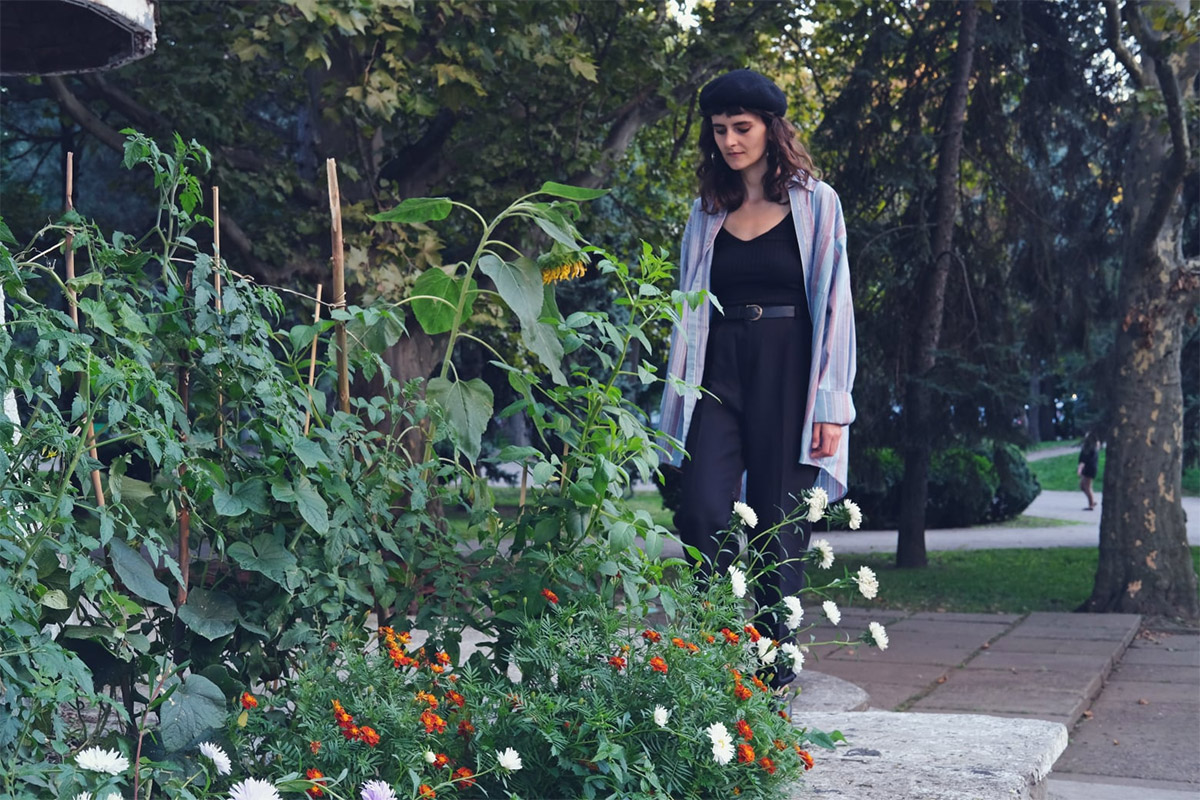 Lilia Nenescu, Guerrilla gardening in the central park, in the pocket garden of the former Guguta Cafe, july 2019. Photo: Vitalie Sprânceană.